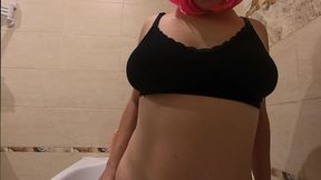 Pink hair MILF shaves her pussy in the bathroom