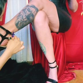 Foot fetish. Washing Dominatrix&#039;s legs and feet, wiping her feet with fur.