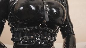 Gagged Latex Rubberdoll Teases Rubber Cock with Vibrator and Pump