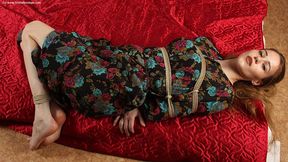 Anne: barefoot girl in flower dress, hogtied on the floor with hemp rope, wiggles and poses (HD MP4)