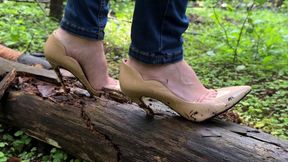 Christian Louboutins in the forest, high heels stuck, dirty louboutins, louboutins stuck, shoe stuck