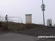Naughty girls so desperate to empty their bladders that they are pissing next to busy roads