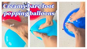 Creamy bare feet popping balloons