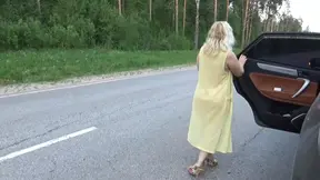 Hot Russian MILF flashes big boobs and bubble butt on the road