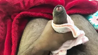 Young black twink in g-string strokes his big uncut cock solo