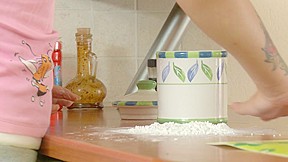 Dark Brown hottie all in flour heated with sex-toy and screwed in the kitchen