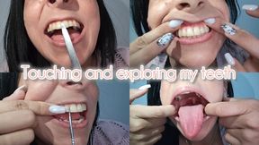 Touching and exploring my teeth