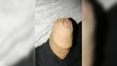 Close-up homemade video of a chap stroking his hard prick