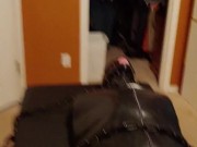 Hairless rubber gimp plugged and in chastity, training