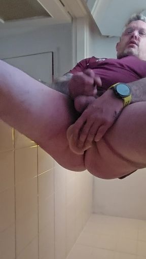Man plays with himself in the shower.