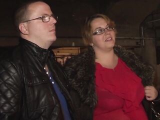 Plump redhead with glasses and large melons is having group sex with boys this babe loves