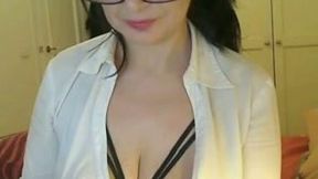 Nerdy gal shows her saggy tits and fingers her cunt in webcam show