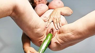 Big mature pussy and huge cucumber