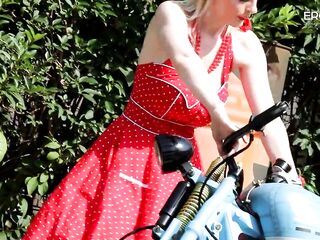 German golden-haired camgirl dangles her melons on the motorcycle, and after that this babe makes a show at EroticOnly!