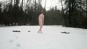 strips and remains naked in the snow