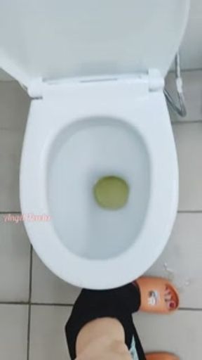 Girl pissed on panties and the floor in a public toilet after holding urine for a long time