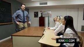 Teacher's pet gets a foursome in the classroom