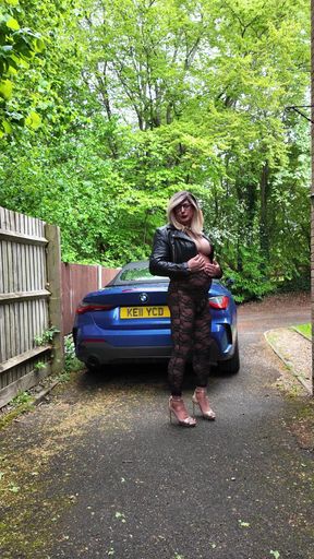 Crossdresser Kellycd2022 in Black Leather Jacket and Lace Catsuit and Heels