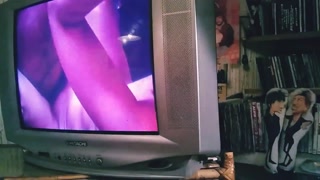 Cecile Pleasure masturbates with videos and magazines