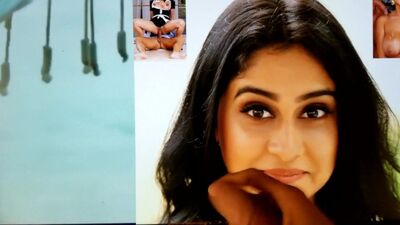 Chap is jerking off on the picture of pretty Indian chick