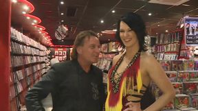 Amateur Brunette Gets a Blowjob to a Guy in the Sexy Shop