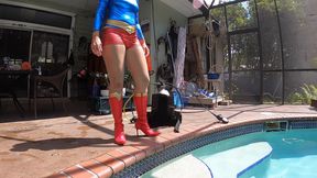Ultra Girl Carissa scuba diving in the pool; high heeled boots and all!