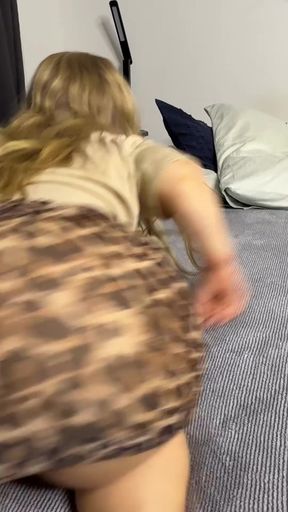 Hot blonde girl in camo skirt