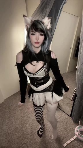 Slim young adult egirl cosplays as a goth catgirl in an amateur
