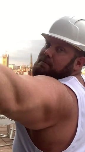 Builder Iron Bending Muscle Flexing and Measuring