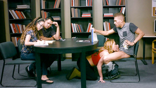 Carter Cruise drops to her knees to suck him off right in the library