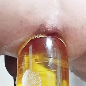 Bottle in ass