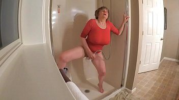 60  GILF masturbating in wet t-shirt