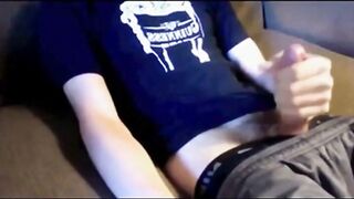 Watch this horny dude spunk on his webcam while giving a hot handjob