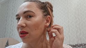 Two earrings in one ear