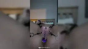 Women's Clit takes Stretched and Clamped While Butt Plug Expands Her