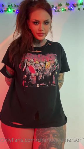 Sexy tattooed woman in black t-shirt