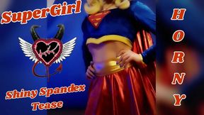 SuperGirl in Shiny Spandex Teases and Plays with Herself