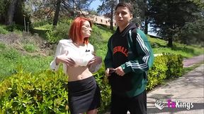 Busty MILF Albaan deep throats cock in public