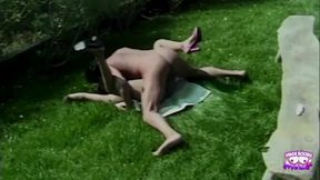 Drilled brunette with big tits takes a handjobs in the field, gets