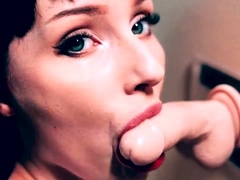 Submissive milf practicing deepthroating skills on a dildo