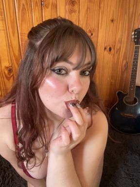 Dominant female humiliates submissive in BDSM scene