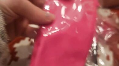 Sissy husband opening his christmas gifts. while in negative chastity