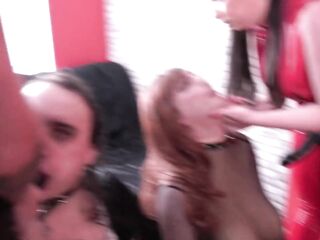 two Mistresses in latex bang their Sissies in the mouth and make 'em lick their latex butts