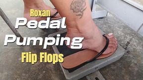 Roxan pumps the machine's pedal while wearing flat flip-flops (3)