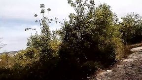 Petite college-aged seduces in nature, big tits on display