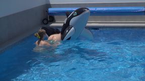 Lesbian Girls Are Having Fun in a Pool with an Inflatable Shark