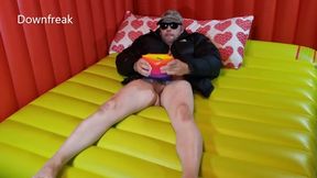 **NO MUSIC** Down Jacket Fetish Guy Fucks Water Wing on Bed of Inflatable Mattress.