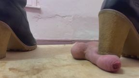 Rough soled boots flatten his cock and drain his balls!