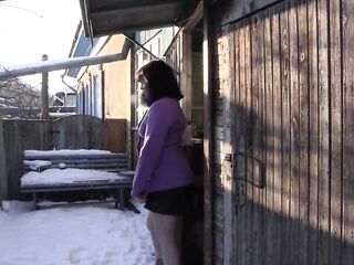 A hot snatch pees on the Christmas snow. A powerful stream of golden urine in the yard.