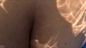 Fit MILF rides big cock in the pool while her fat ass shakes